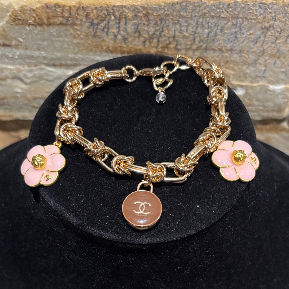 Chunky Gold Bracelet with Pink & Gold CC Floral Charms and a brown skittle charm